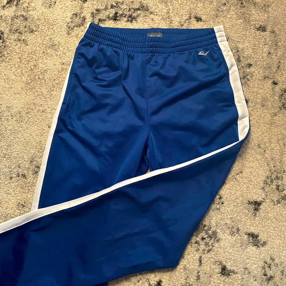 blue sweatpants with white side stripe